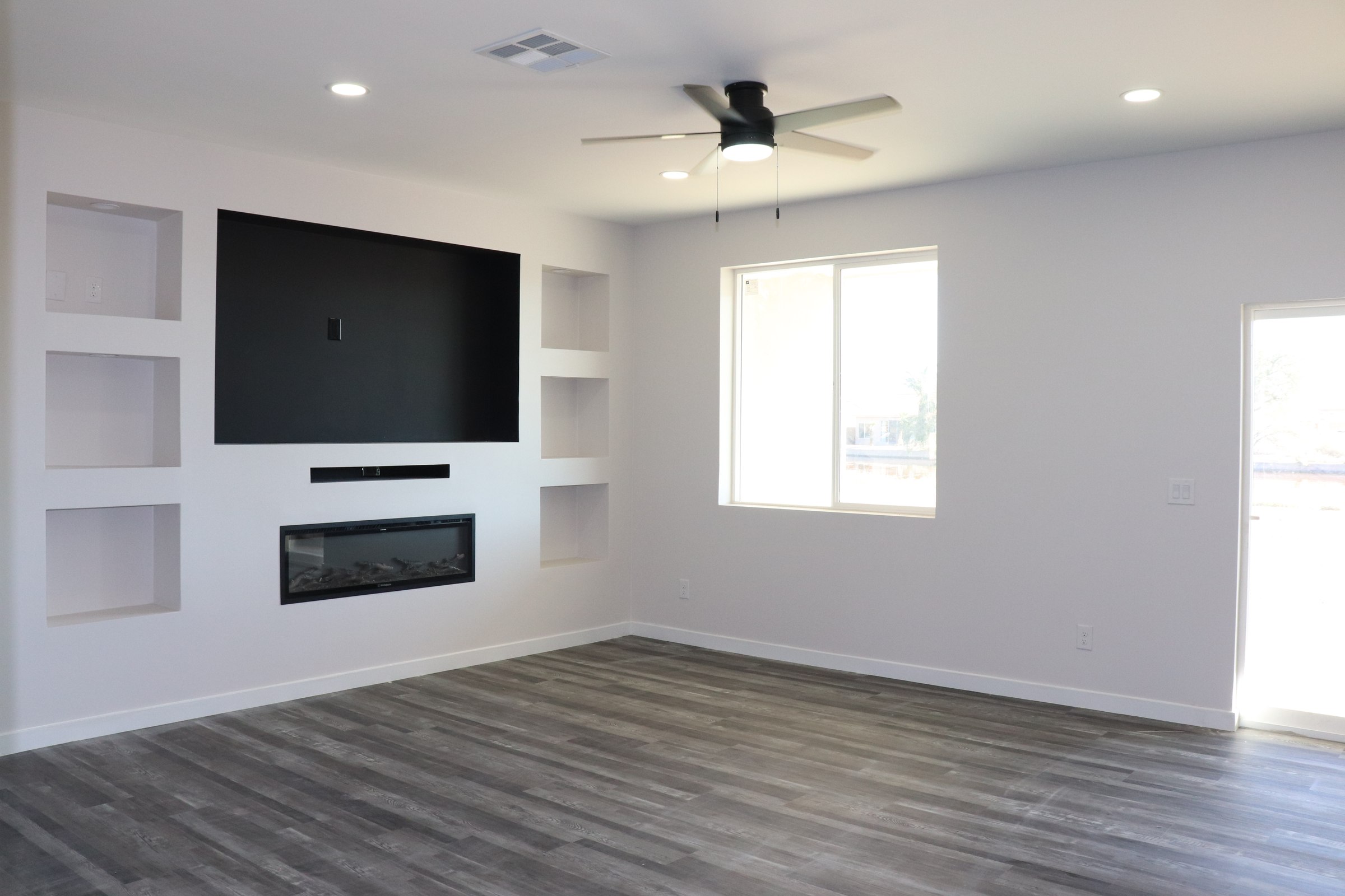 Finished custom living room by La Casa Bonita